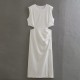 This is a new summer women's dress with a European and American style, featuring a round neck, solid color, and a hollowed-out pleated slit at the waist This is a new summer women's dress with a European and American style, featuring a round neck, solid color, and a hollowed-out pleated slit at the waist