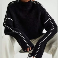 The new casual knitted sweater with a contrasting color and patchwork line design is sleeveless and simple