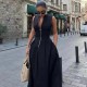 A new women's dress with a European and American style and French design, featuring a round neck, sleeveless and cinched waist, exudes a commuting charm A new women's dress with a European and American style and French design, featuring a round neck, sleeveless and cinched waist, exudes a commuting charm