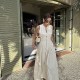 A new women's dress with a European and American style and French design, featuring a round neck, sleeveless and cinched waist, exudes a commuting charm A new women's dress with a European and American style and French design, featuring a round neck, sleeveless and cinched waist, exudes a commuting charm