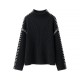 The new casual knitted sweater with a contrasting color and patchwork line design is sleeveless and simple The new casual knitted sweater with a contrasting color and patchwork line design is sleeveless and simple